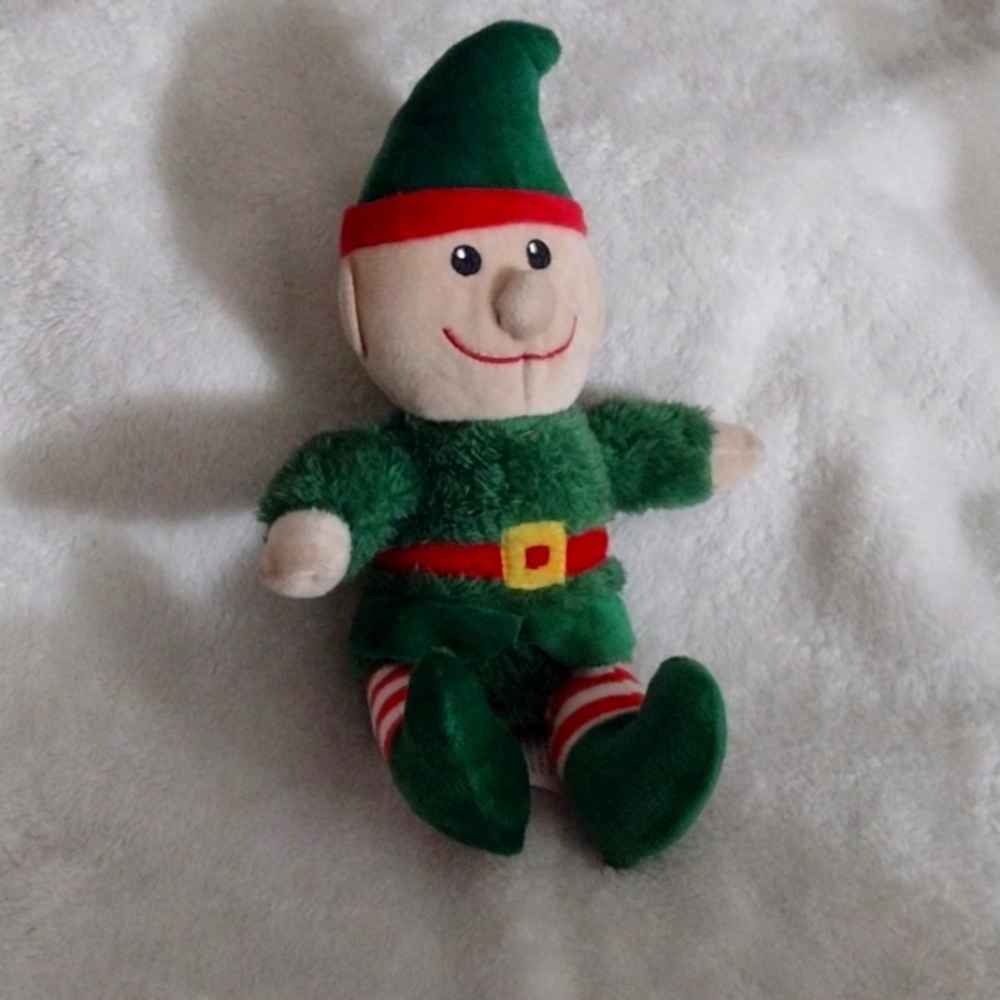 A stuffed animal elf